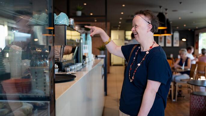 A participant practising everyday skills in a café